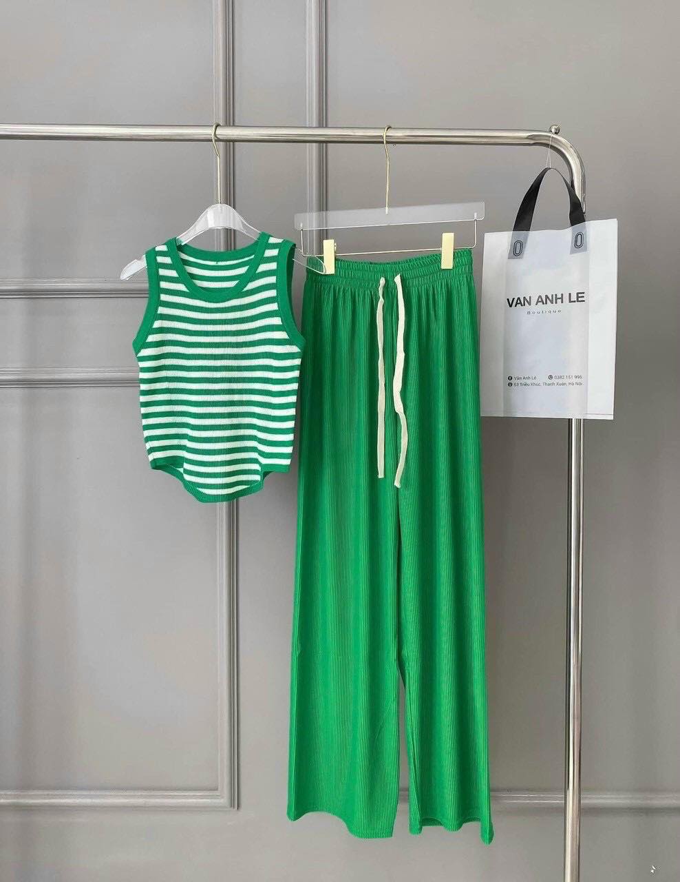 Women's set includes elastic pants and crop top